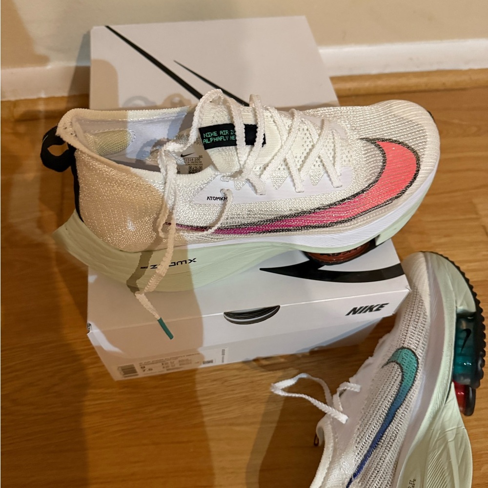 NIB, never worn, Nike air zoom alpha next%, women size 9